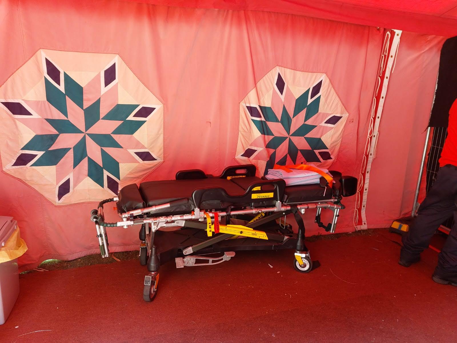 First Aid stretcher in a treatment tent
