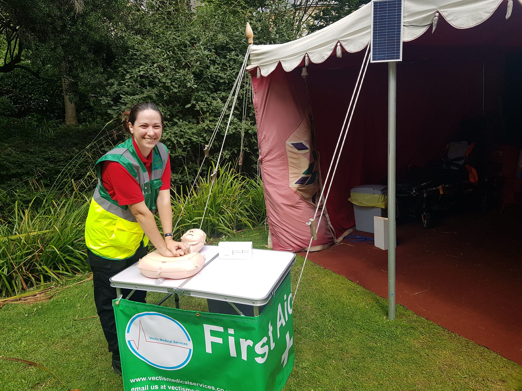 First Aid person demonstrating CPR